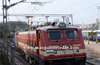 Electric loco hauls train from city for the first time